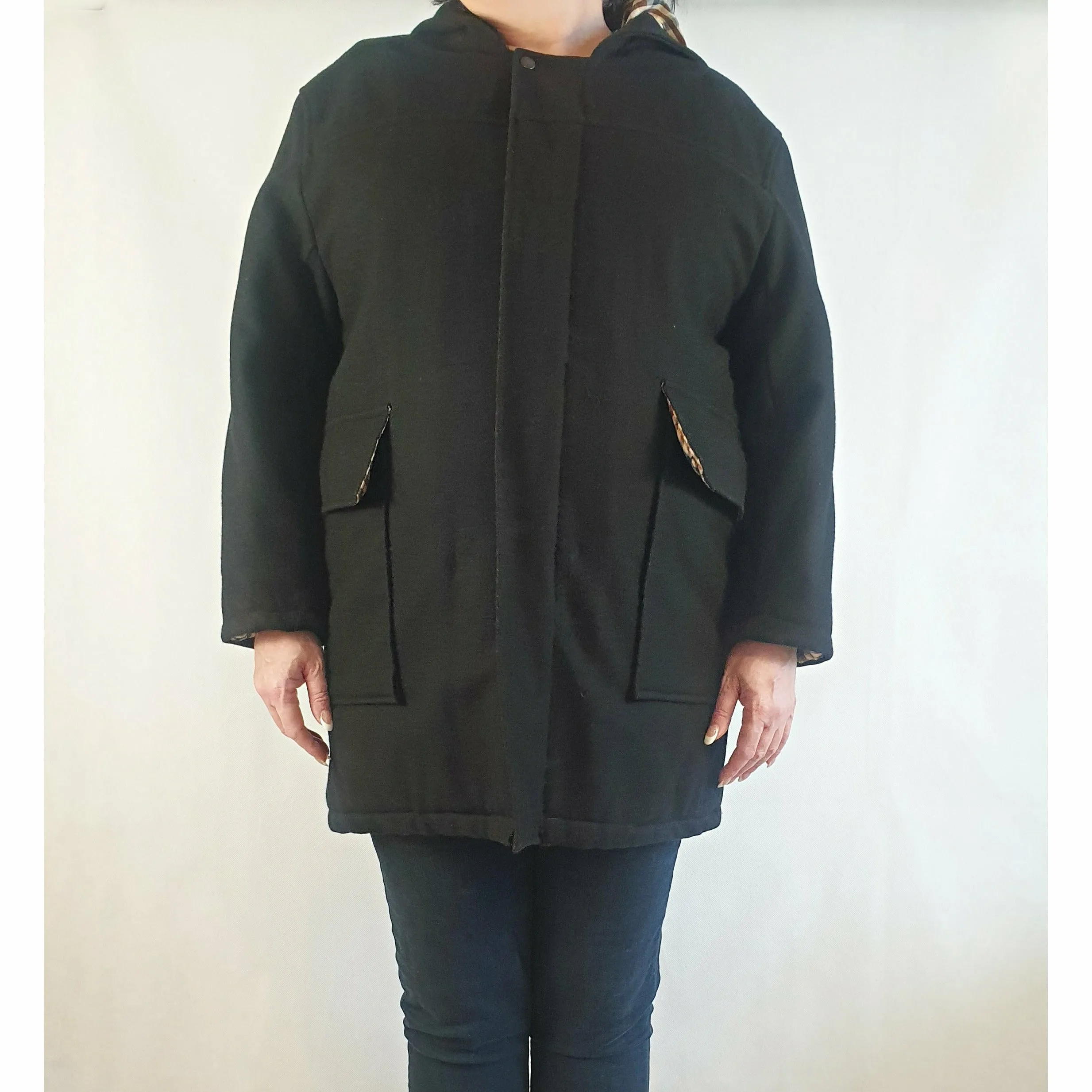 Black wool or wool mix feel coat with hood, front pockets and gingham lining - fits size 16