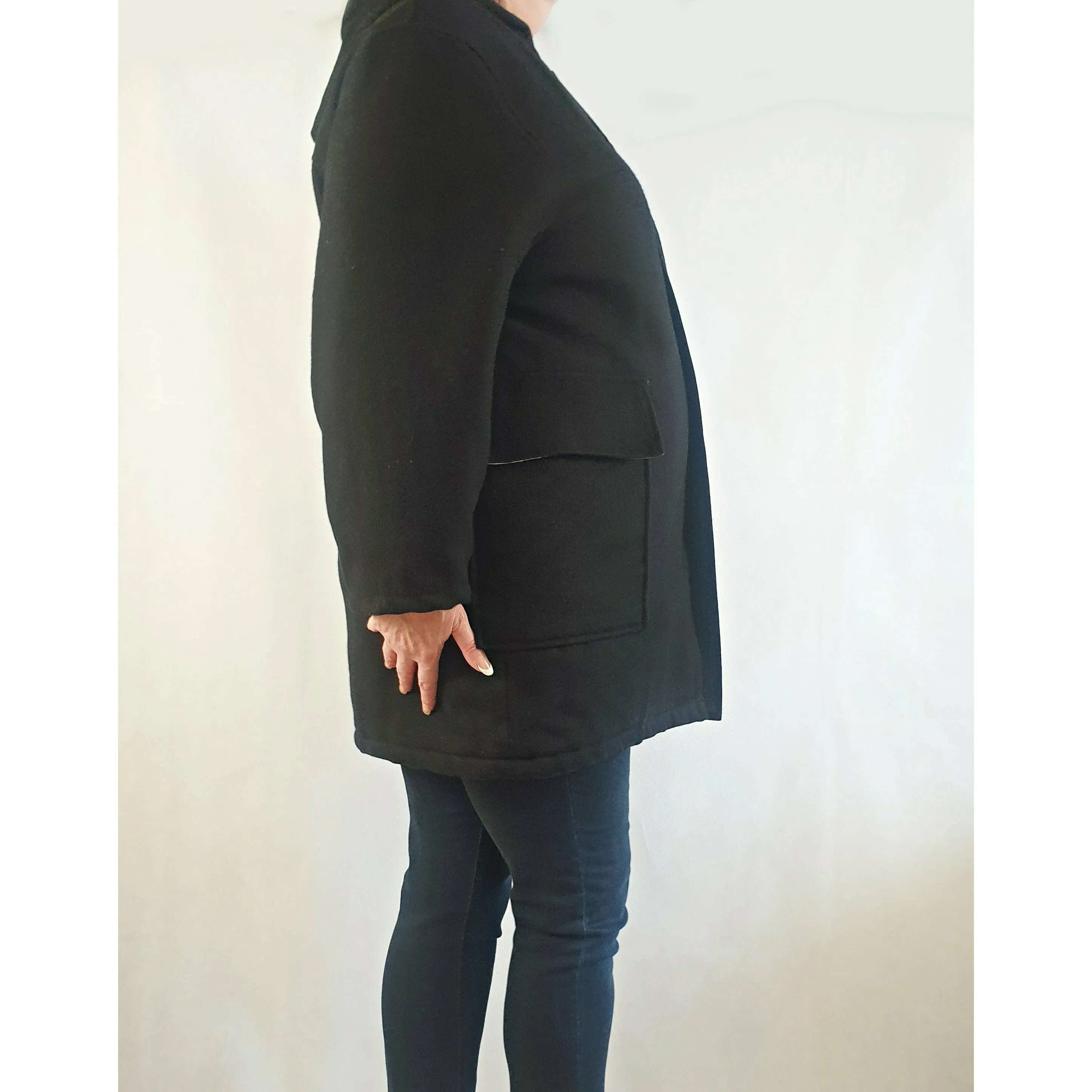 Black wool or wool mix feel coat with hood, front pockets and gingham lining - fits size 16