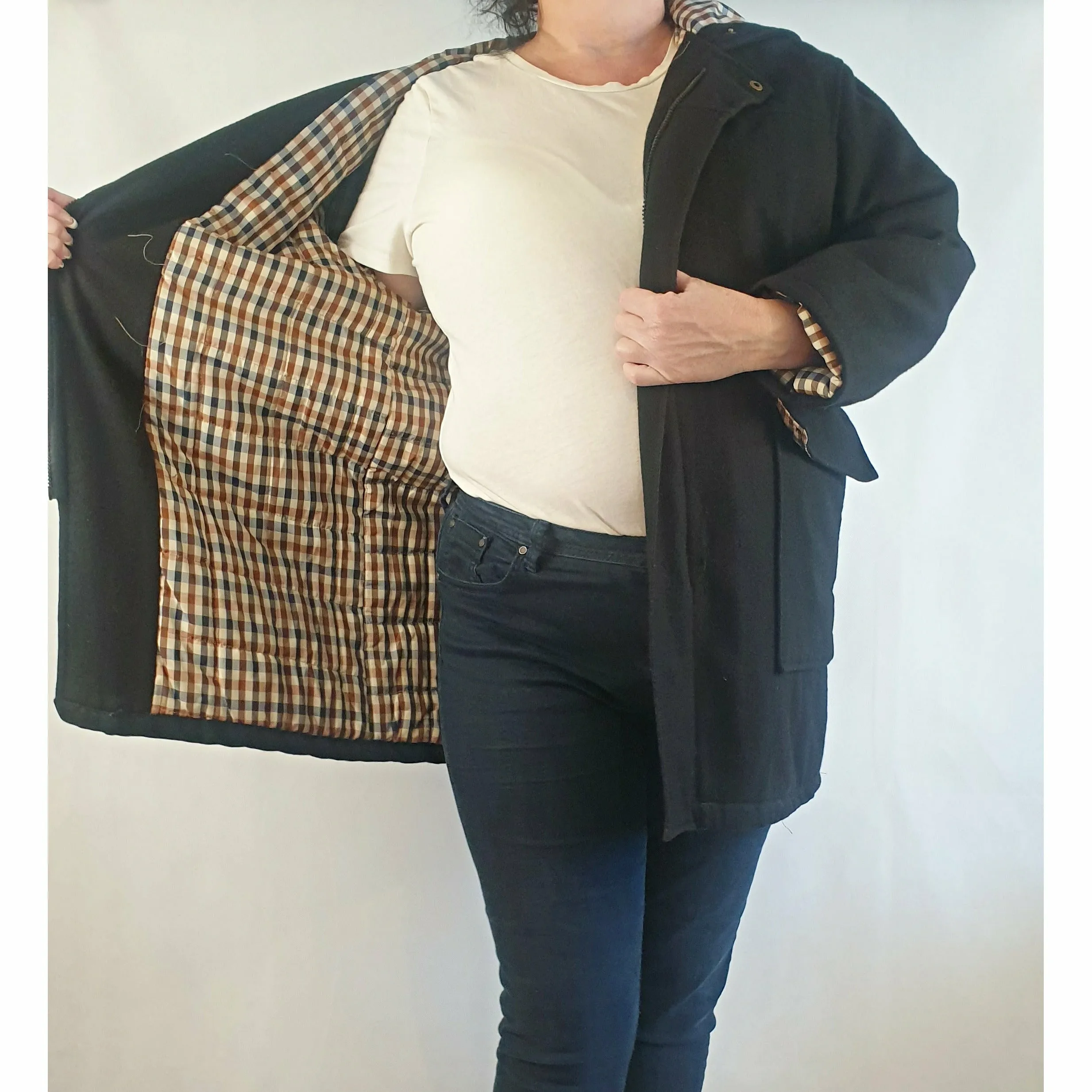 Black wool or wool mix feel coat with hood, front pockets and gingham lining - fits size 16